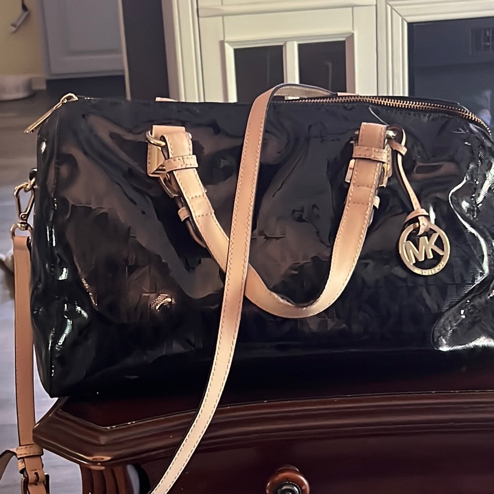Michael Kors purse. Black, patent material. Size large, 13 x 8.5 x 8.5.